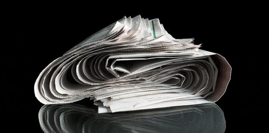 A large stack of double folded newspaper
